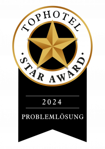 Logo der Tophotel Star Award Auszeichnung 2024 in der Kategorie "Problemlösung" 2024